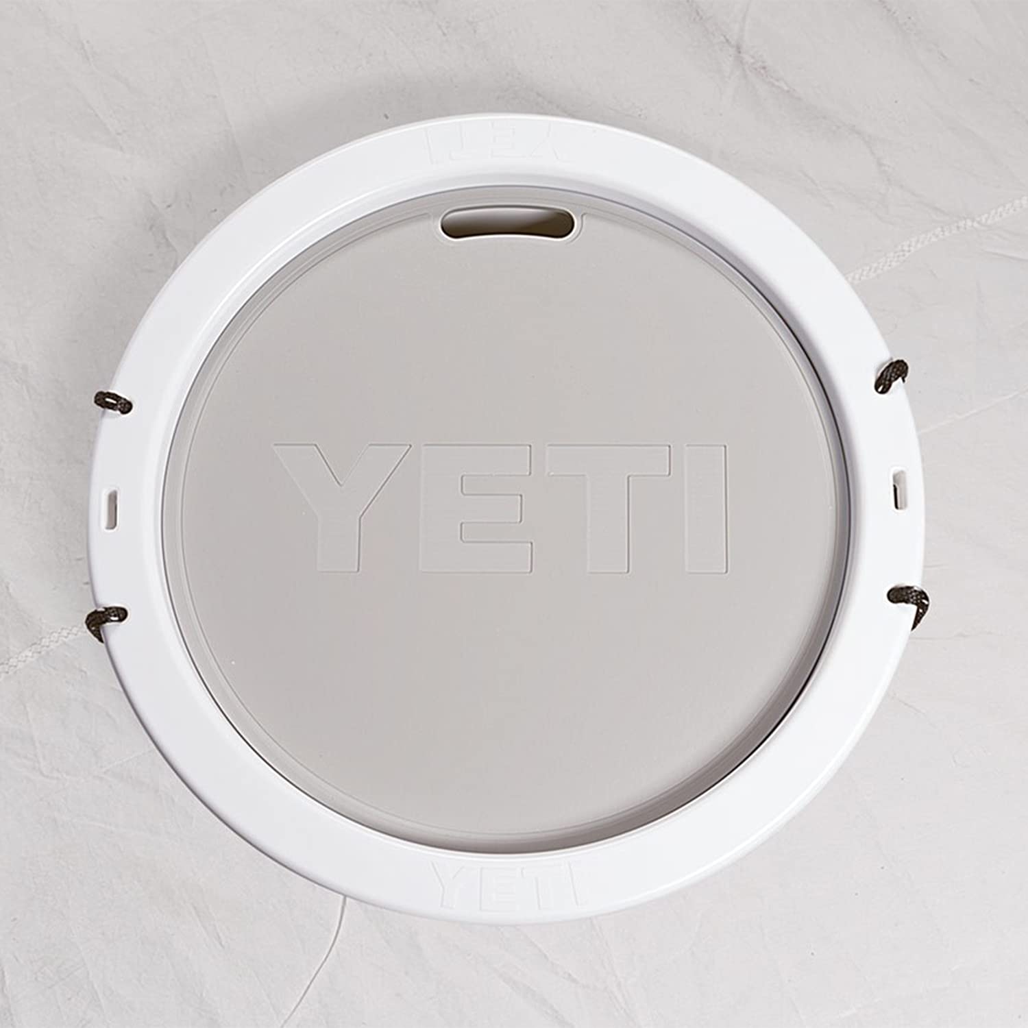 YETI Tank Lid used as a cutting board for outdoor food prep