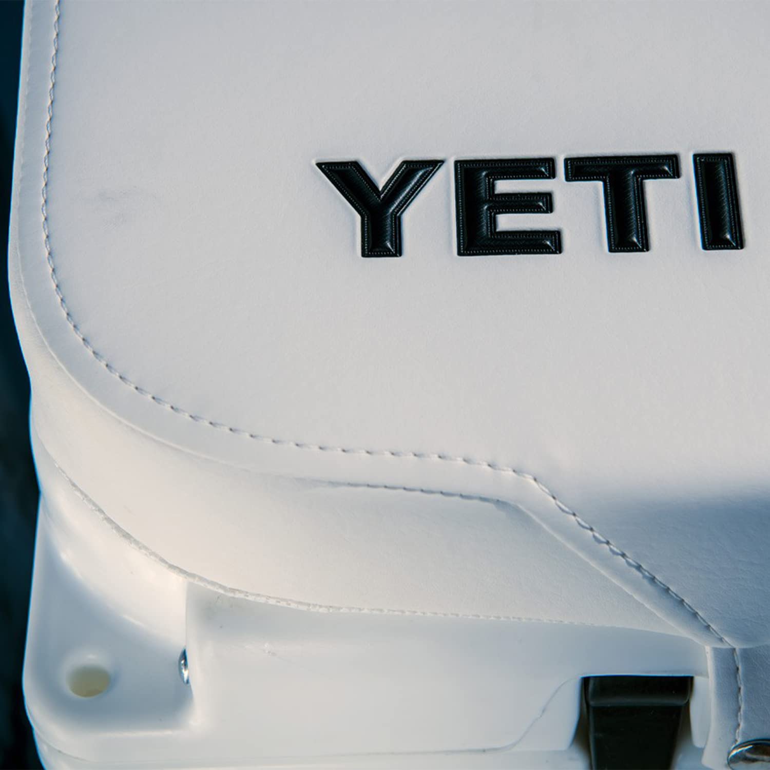 Cushion placed on boat seating with YETI Tundra 160 for comfort