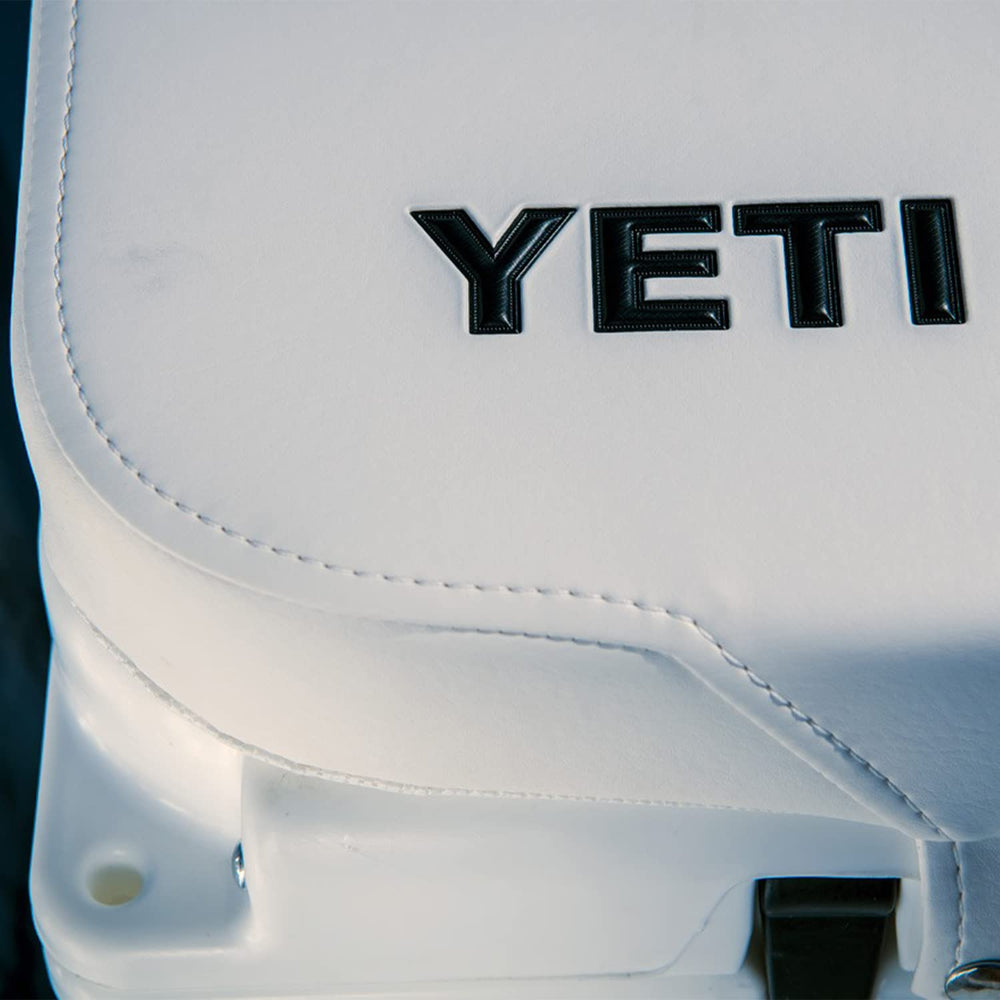 Cushion placed on boat seating with YETI Tundra 160 for comfort