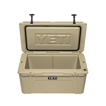YETI Tundra 65 Desert Tan dry goods basket included for organized packing.