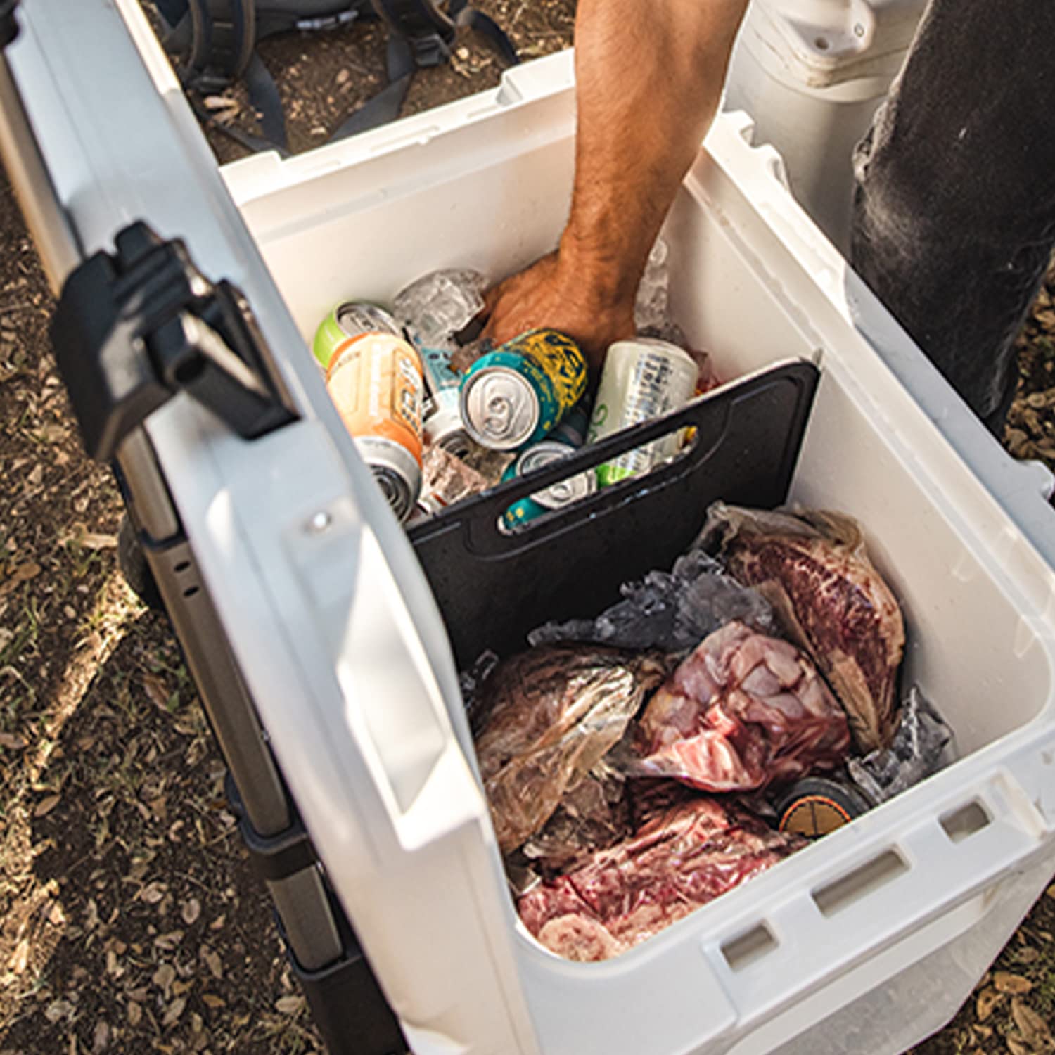 YETI Tundra divider doubles as a cutting board when not in use.