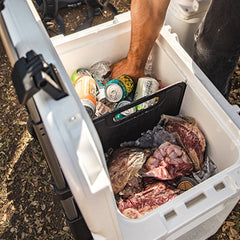 YETI Tundra divider doubles as a cutting board when not in use.