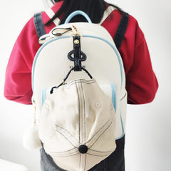 YEZILUU durable clip-on hat holder keeps hats secure on a backpack.