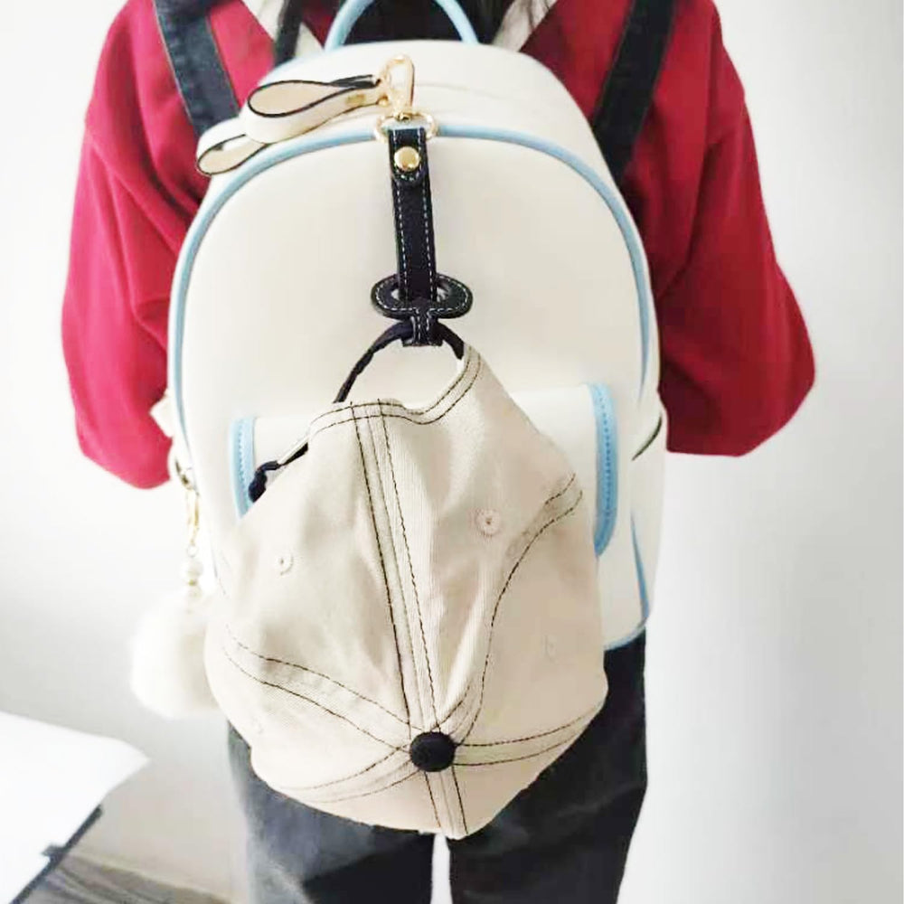 YEZILUU hat clip on a backpack demonstrating easy, hands-free use