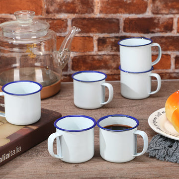 Close-up of Yinder enamel mug showing durable steel with enamel coating.