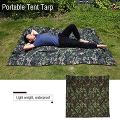 Yosoo tent tarp used as a rain canopy over a campsite.
