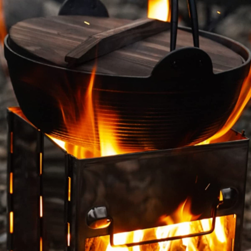 Young Guys of the Universe grill-firepit-setup demonstrates versatile wood-burning grilling in the wild.