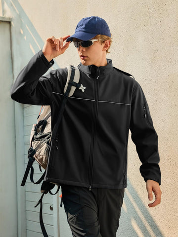 Yousify mens softshell jacket shows adjustable cuffs and drawstrings to seal out cold