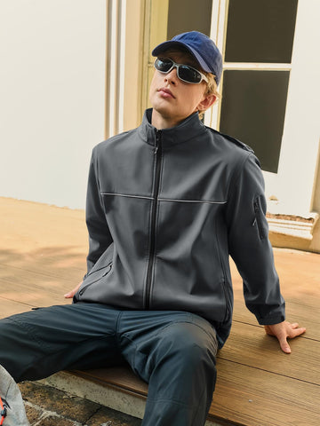 Yousify men's softshell jacket pocket design with zippered pockets and inner pocket.