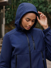 Yousify women's fleece-lined rain jacket adjustable hood shields you from wind and rain.
