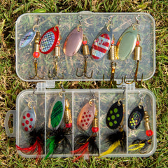 Five rooster tail spinning lures with sharp treble hooks