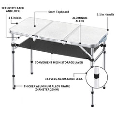 Yriuat folding table in outdoor use ready for beach or campsite setup.