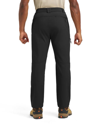 YSENTO men's insulated snow pants worn in snow conditions demonstrating versatile outdoor activity