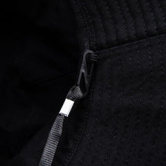 YTNKIV large-head hat shown in packaging for easy storage and travel.
