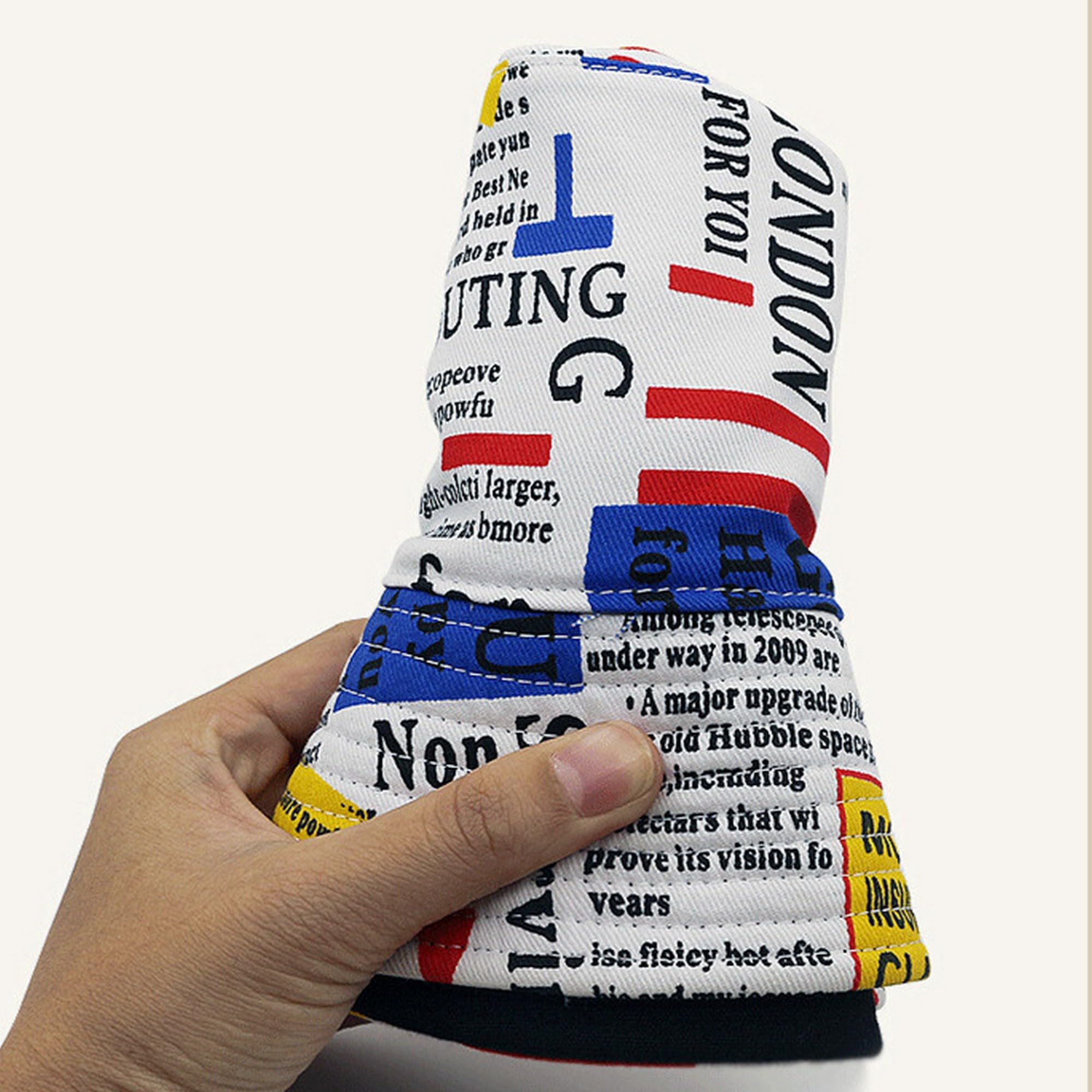 YTNKIV reversible bucket hat design offering two styles in one.