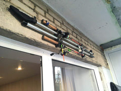 Close-up of wall-mount hardware for YYST rod rack