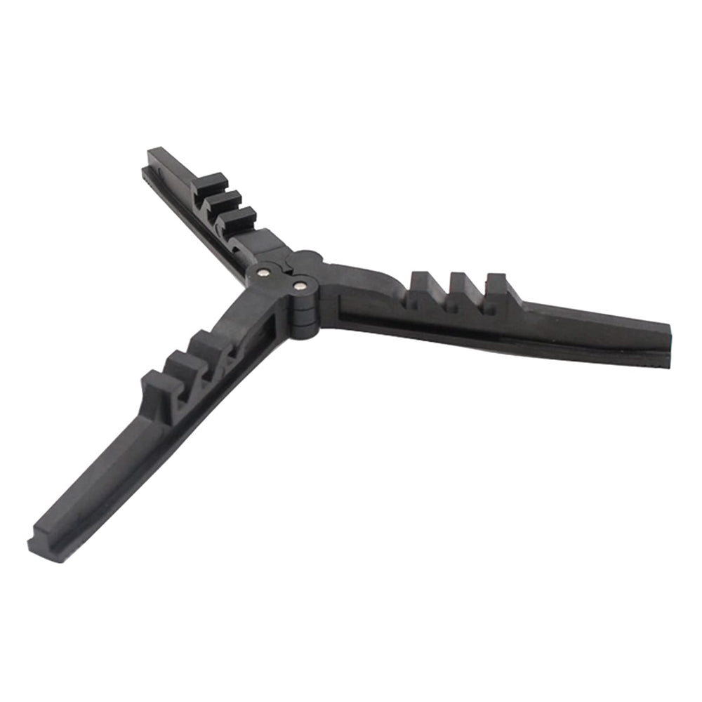 Zaagot canister stabilizer folded for compact storage and backpacking.