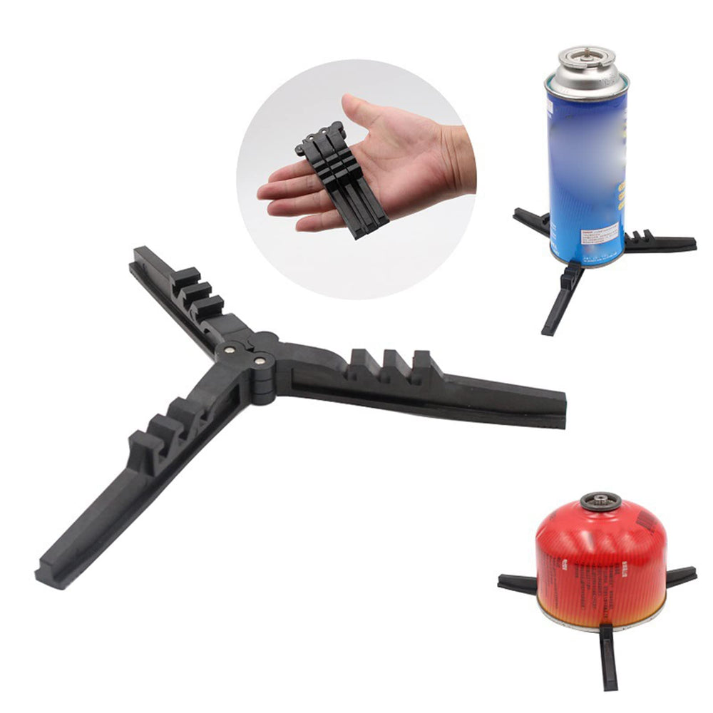 Zaagot canister stabilizer unfolded showing wide stable base on uneven terrain.
