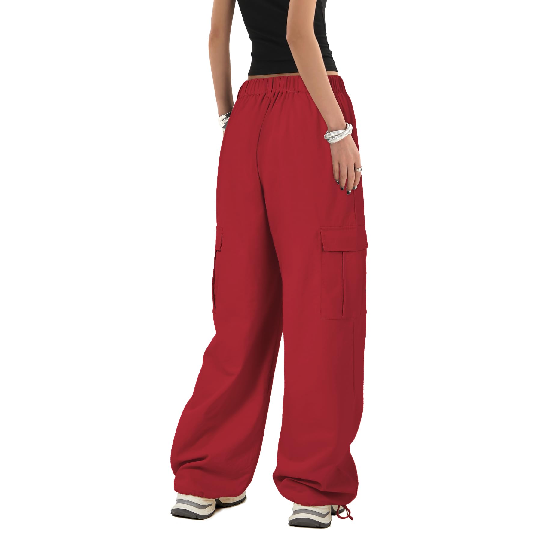 Zando Red Cargo Pants pocket detail demonstrating secure zip pockets for essentials.