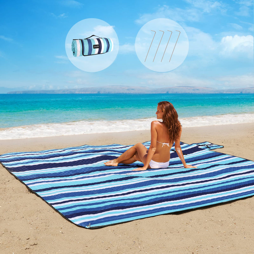 ZAZE beach blanket blue stripe on sand for family lounging and sand-free comfort.