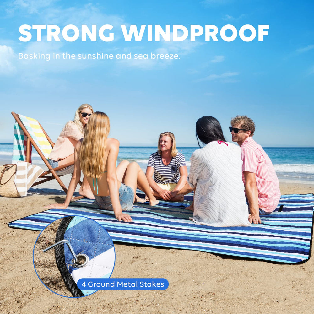 ZAZE beach blanket with sandproof coating keeps sand off and easy cleanup.