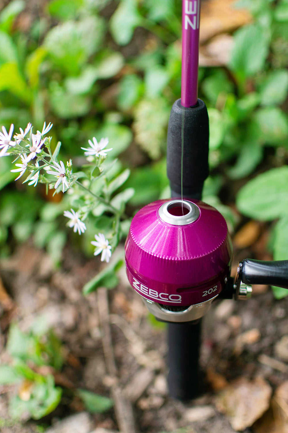 Fiberglass rod with EVA handle on Zebco 202 spincast