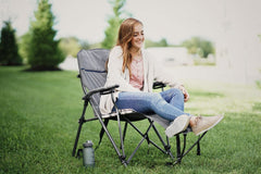 Zenithen portable outdoor chair open on campsite for comfortable seating.