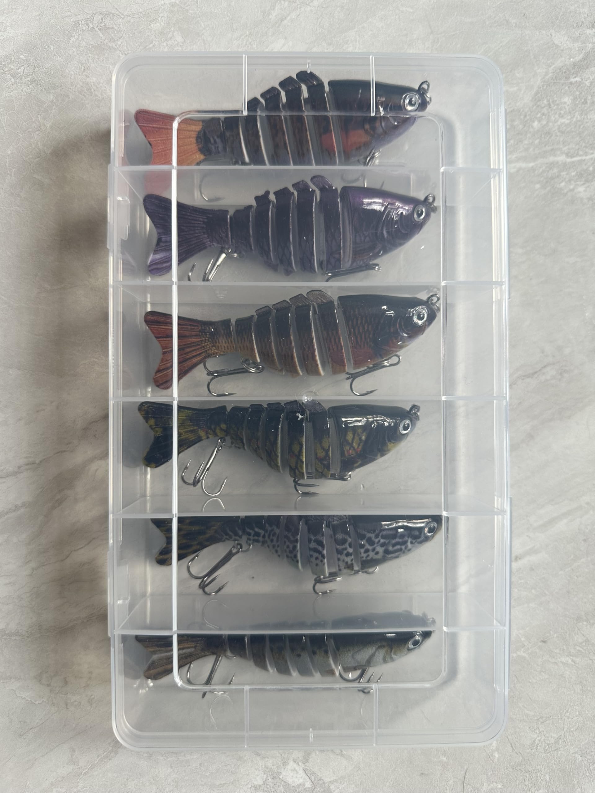 Plastic crush-resistant storage box included with lures