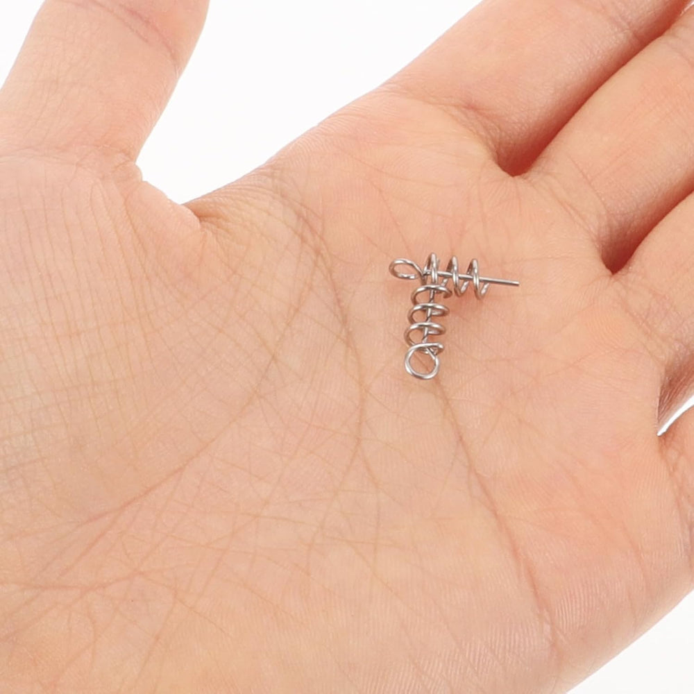 Latch pin components and screws for fishing gear close-up