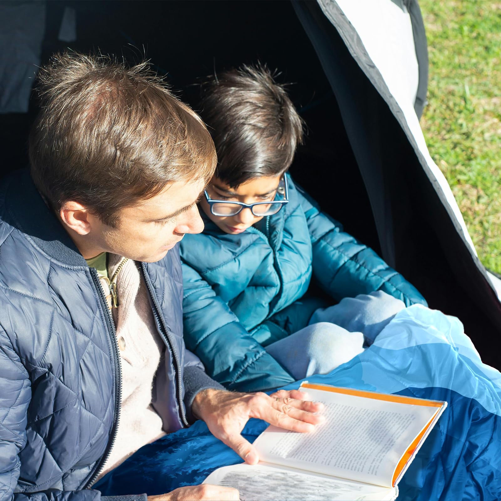zzlamb camping blanket with poncho clip transforms into cloak for warm, hands-free use