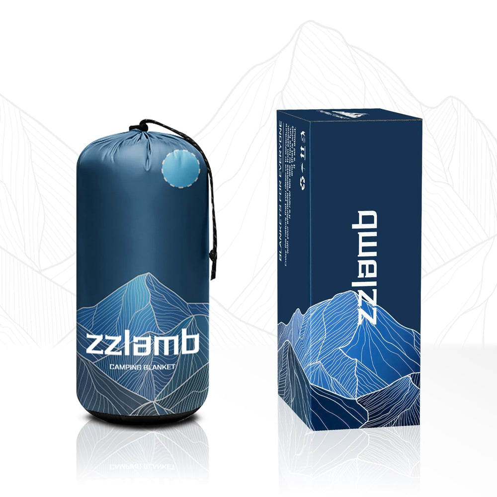 zzlamb Puffy Camping Blanket in Serenity Blue Fade adds cozy style to any setup.